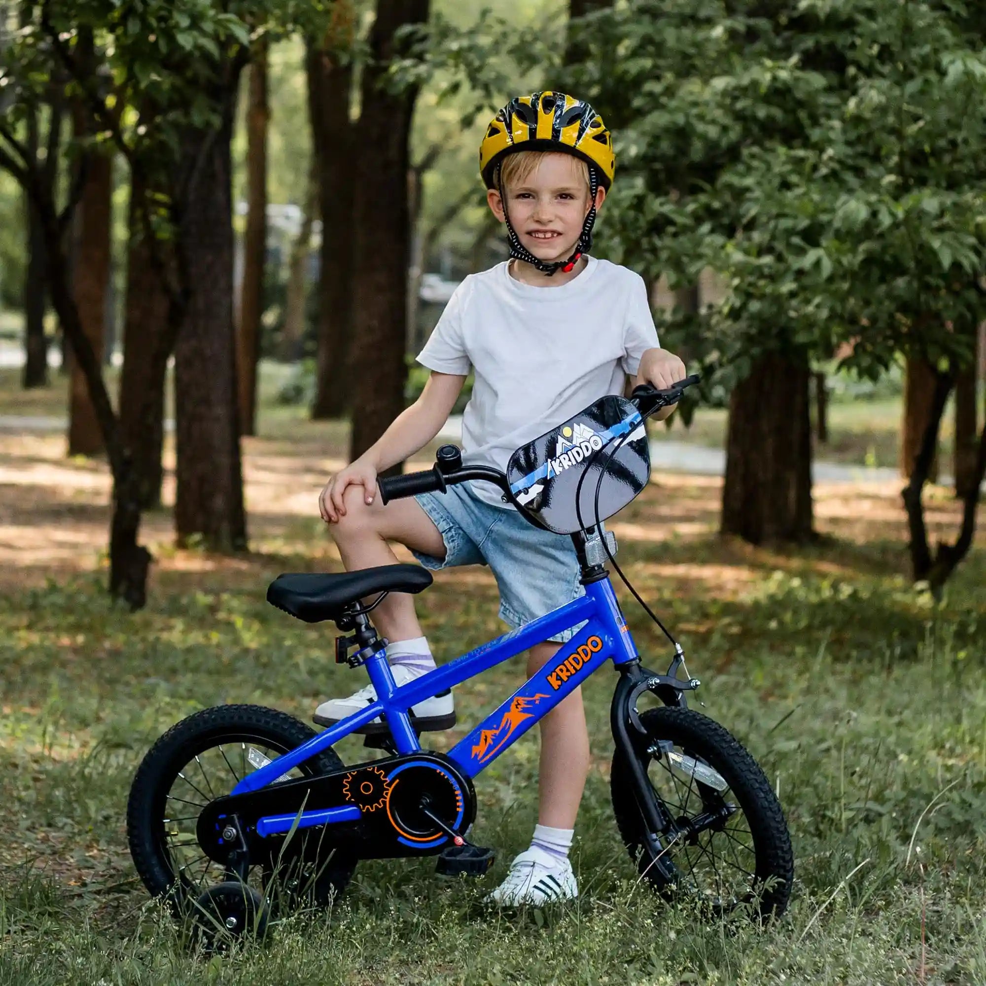 Toddler boy with KRIDDO blue 16 inch bicycle