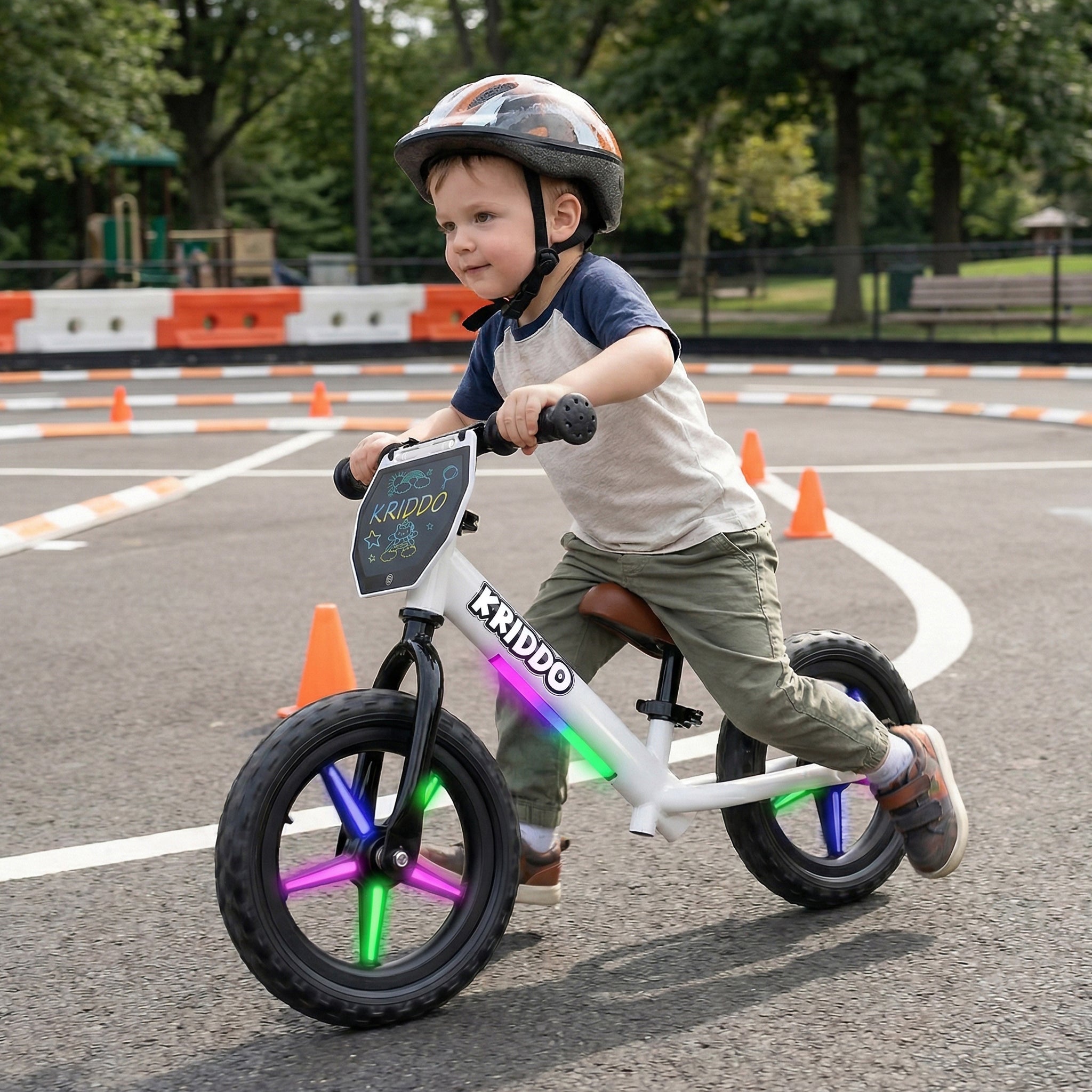 Child riding KRIDDO balance bike with light up wheels