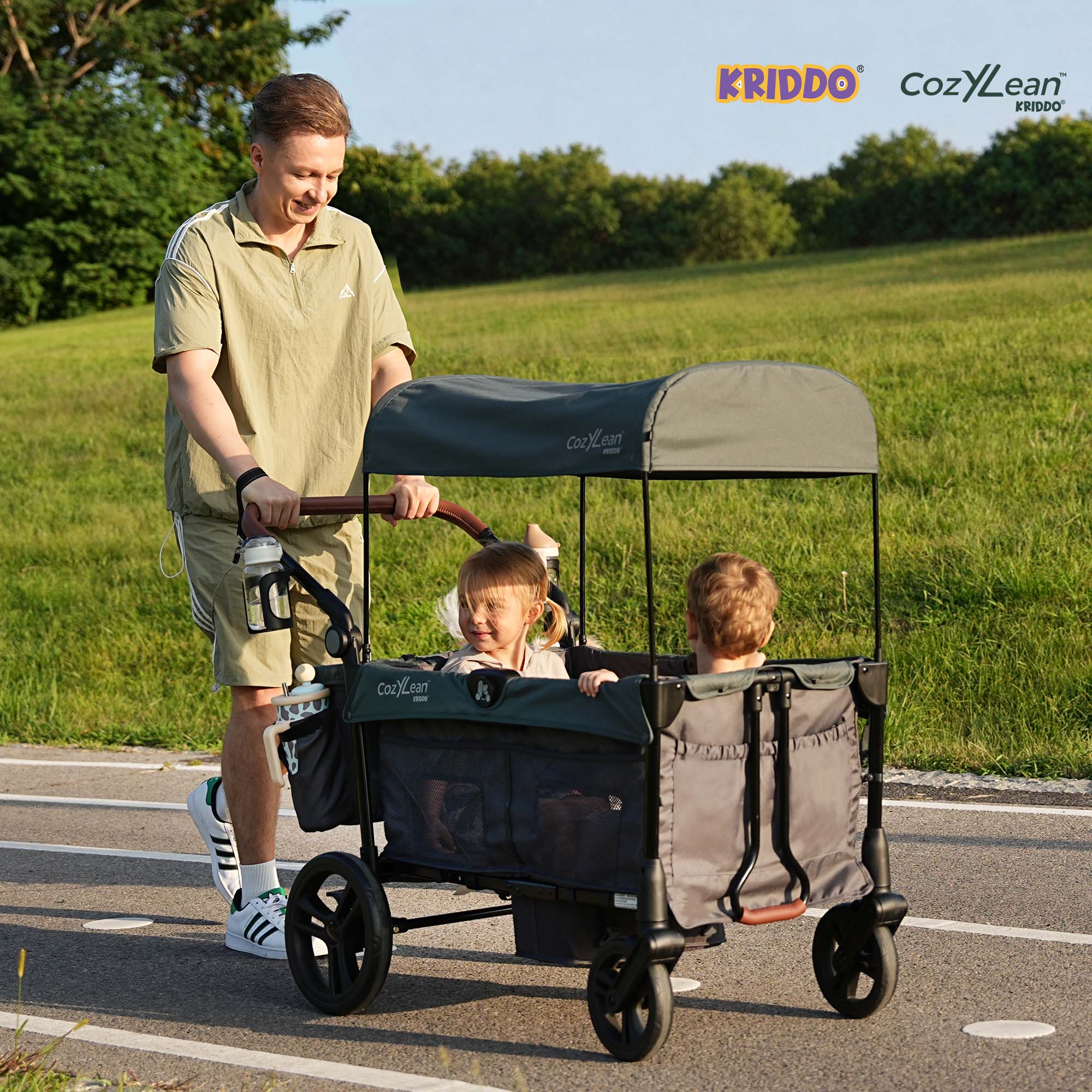 KRIDDO stroller wagon has a dark gray canopy and side panels with mesh windows.