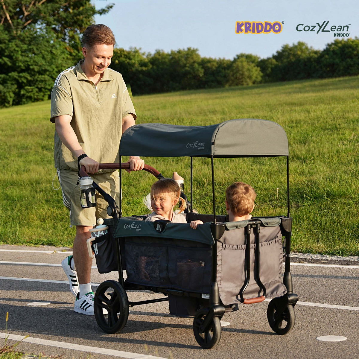 KRIDDO stroller wagon has a dark gray canopy and side panels with mesh windows.